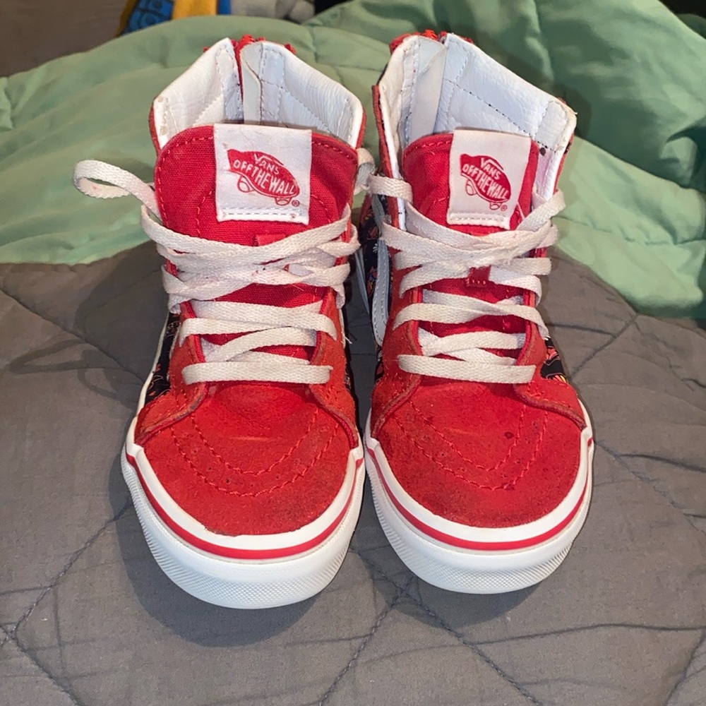 Butterfly and red high top vans